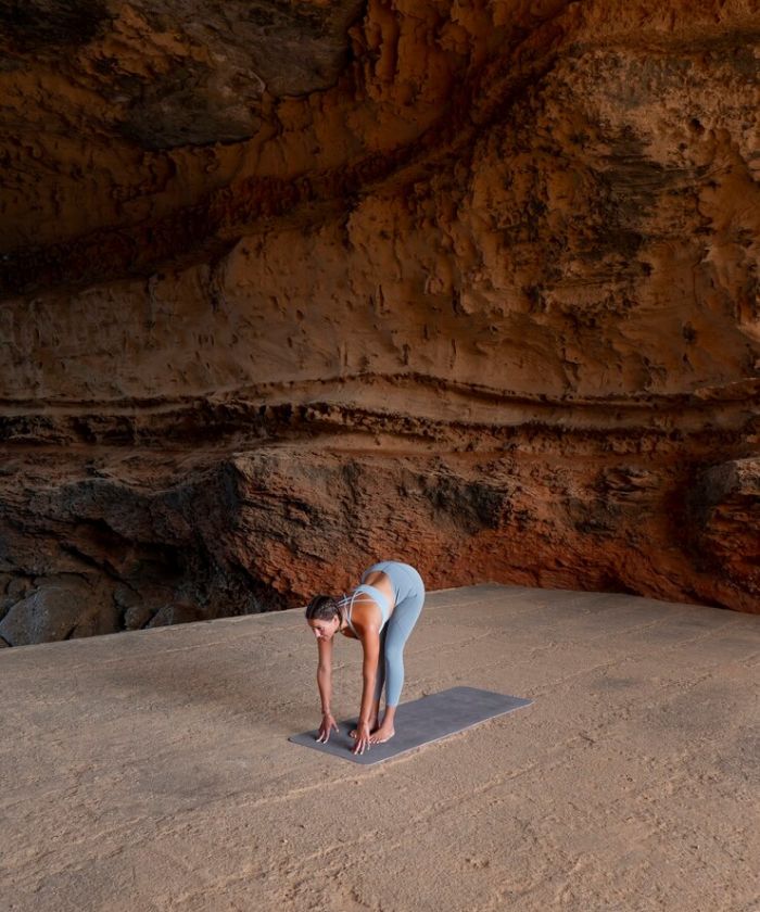 Tourist doing Yoga at Wadi Rum