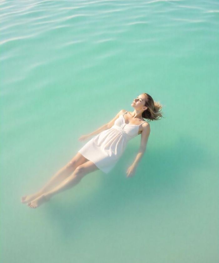 Tourist Floating in The Dead sea 