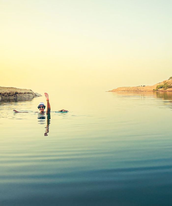 Tourist Floating in Dead-Sea