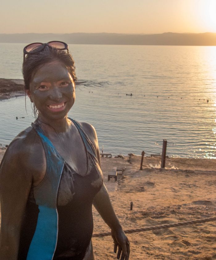 Tourist enjoying Mudding at the Dead Sea